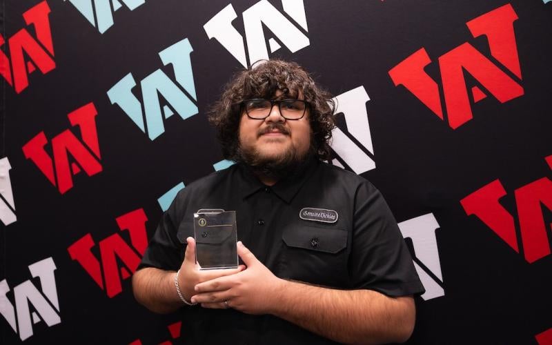 Hector Zepeda holds Emerging Leader Award from the US Department of Energy