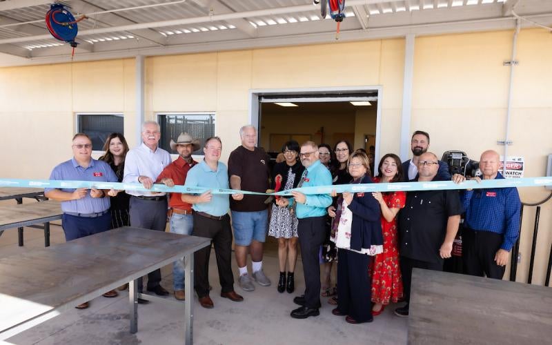 AWC leaders and La Paz County community members gather to cut the ribbon at the Parker Welding Lab.