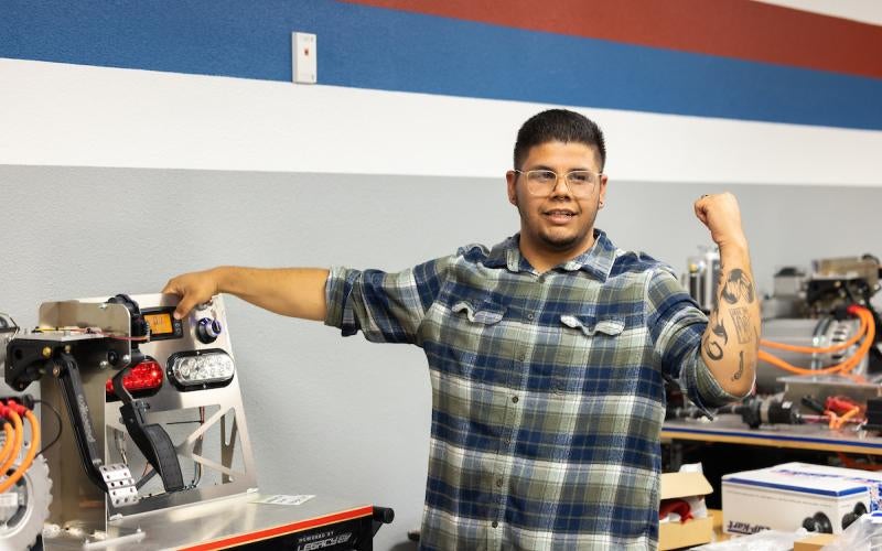 Jesus Castillo Flores demonstrates EV classroom simulation tools during the Electric Vehicle Technology Showcase in April 2025.