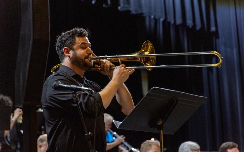 Student plays the trombone at the AWC Jazz Ensemble Spring Concert 2024.