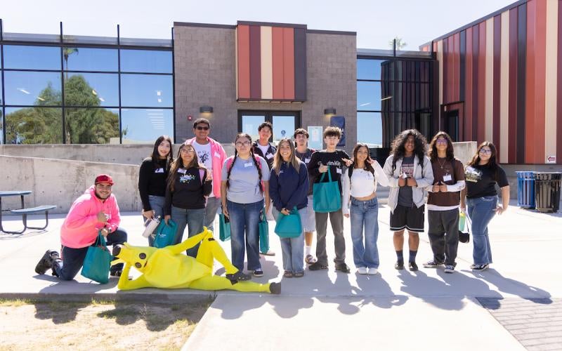 Students from Cibola H.S. pose outside of the AWC/NAU-Yuma Academic Library.