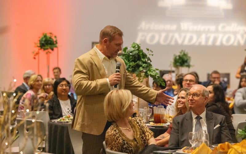 Community members engaging at the 2023 Schoolhouse Soirée hosted by the AWC Foundation.