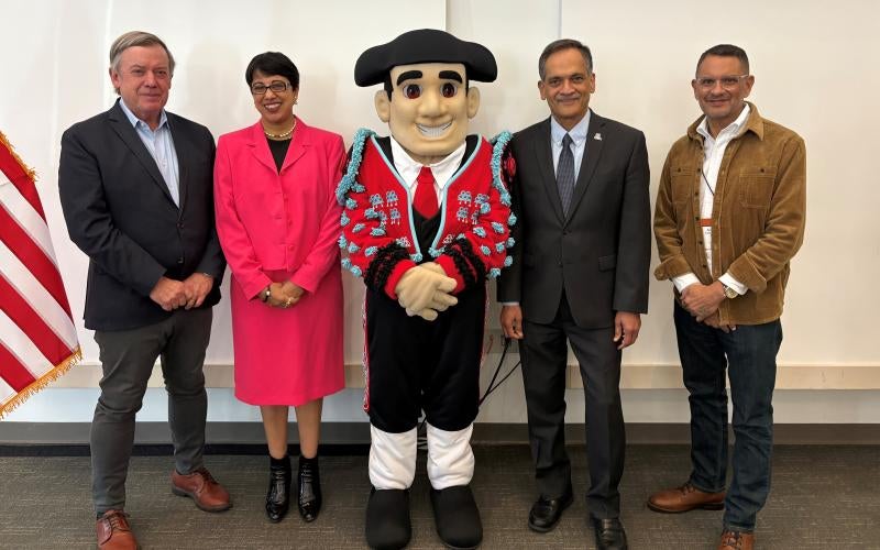 Left to right: Michael Crow, ASU President; Mateo the Matador, AWC Mascot; Dr. Reetika Dhawan, AWC CEO and Vice President of Workforce & Healthcare Programs; Suresh Garimella, AU President; José Luis Cruz Rivera, NAU President.