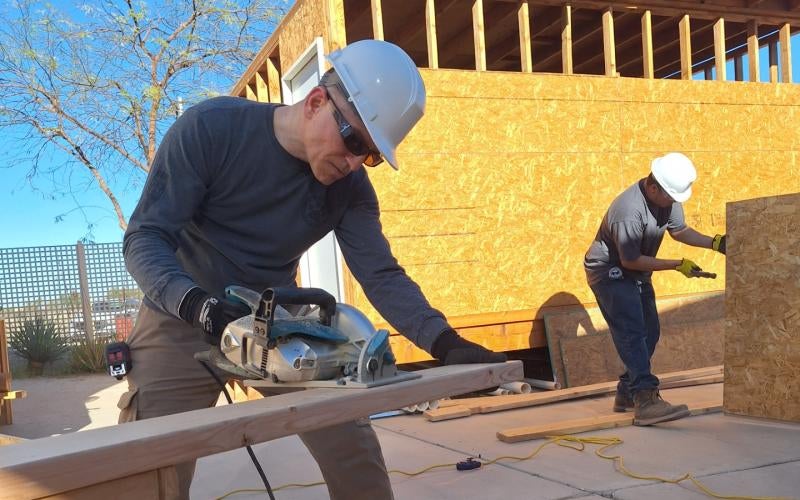 Carpentry students work on a project as they train to receive their certification in Basic Carpentry.