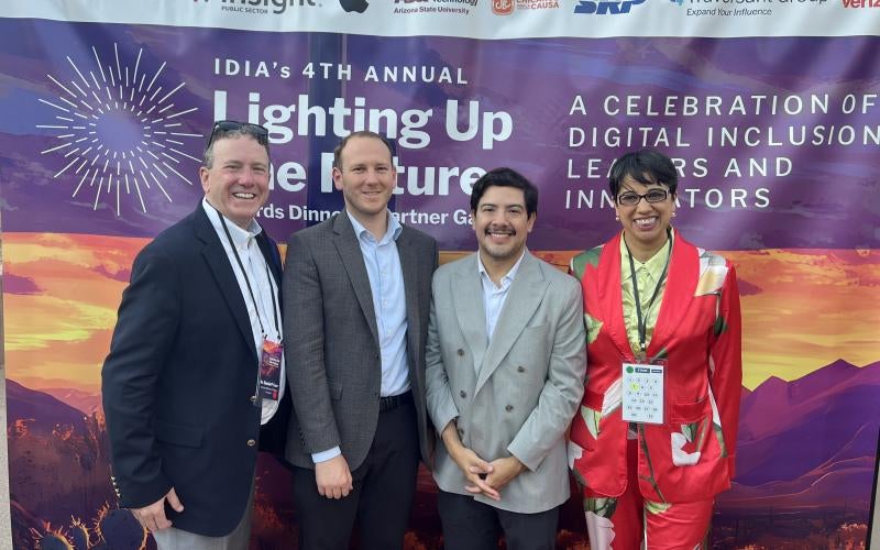Pictured left to right: AWC President Dr. Daniel Corr; Ian O’Grady, Policy Advisor for Commerce, Arizona Governor’s Office; Larry Sandigo, Director of Cabinet Affairs, Arizona Governor's Office; and Reetika Dhawan at the IDIA Lighting up the Future Benefit Dinner in Phoenix, Arizona on May 6, 2025.
