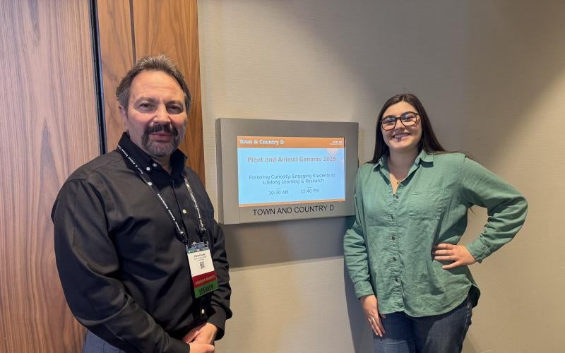 Dr. Budak stands with an Arizona Western College undergraduate student outside of their workshop at the PAG 32 conference in San Diego, Calif.
