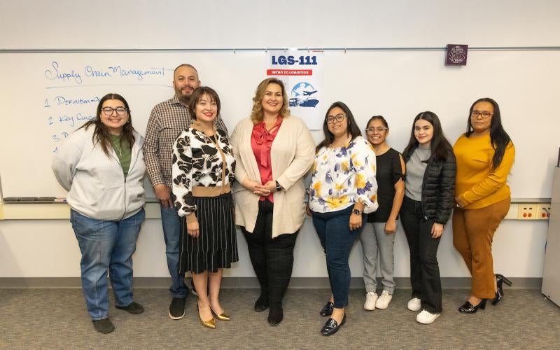 The LGS 111 Course and Buna George gather for a photo at the San Luis Learning Center on November 19th.