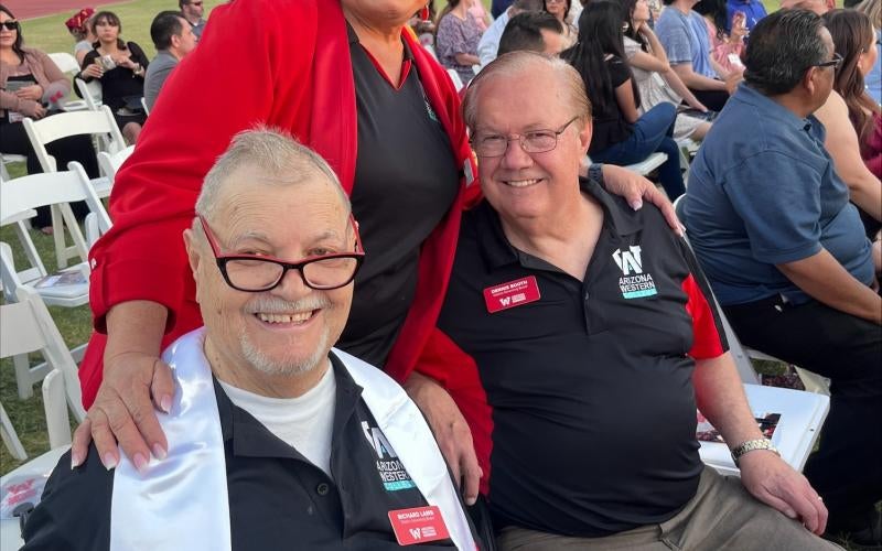 RIchard Lamb (front) at commencement along with fellow governing board members, Maria Chavoya and Dennis Booth