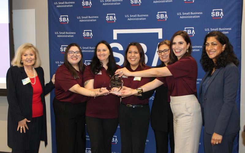 AWC SBDC team members (left to right) Judith Aceves, Leticia Williams, Mayra Franquez, Mary Carmen Lopez, and Crystal Mendoza pictured with former state senator Lori Klein Corbin and SBA Arizona Deputy District Director Shivani Dubey the AZ Small Biz Con on May 4, 2026.