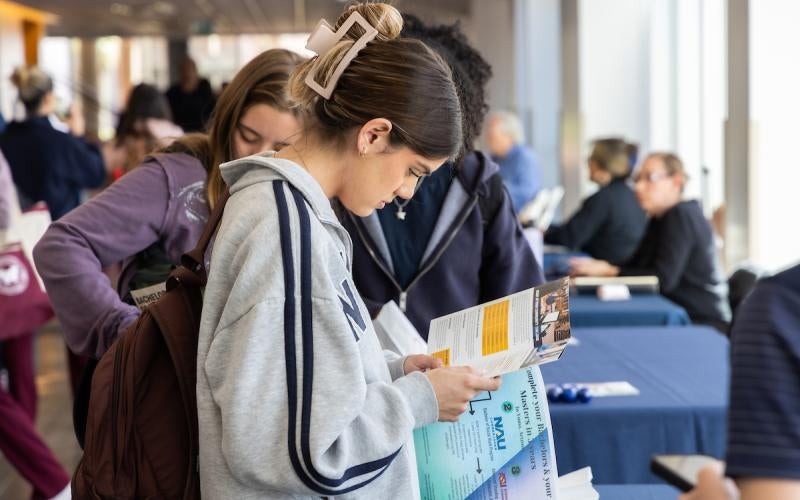 Student explores transfer opportunities at one of AWC's transfer events.