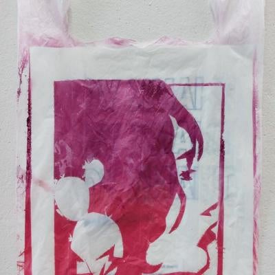 printmaking piece of a woman on a bag