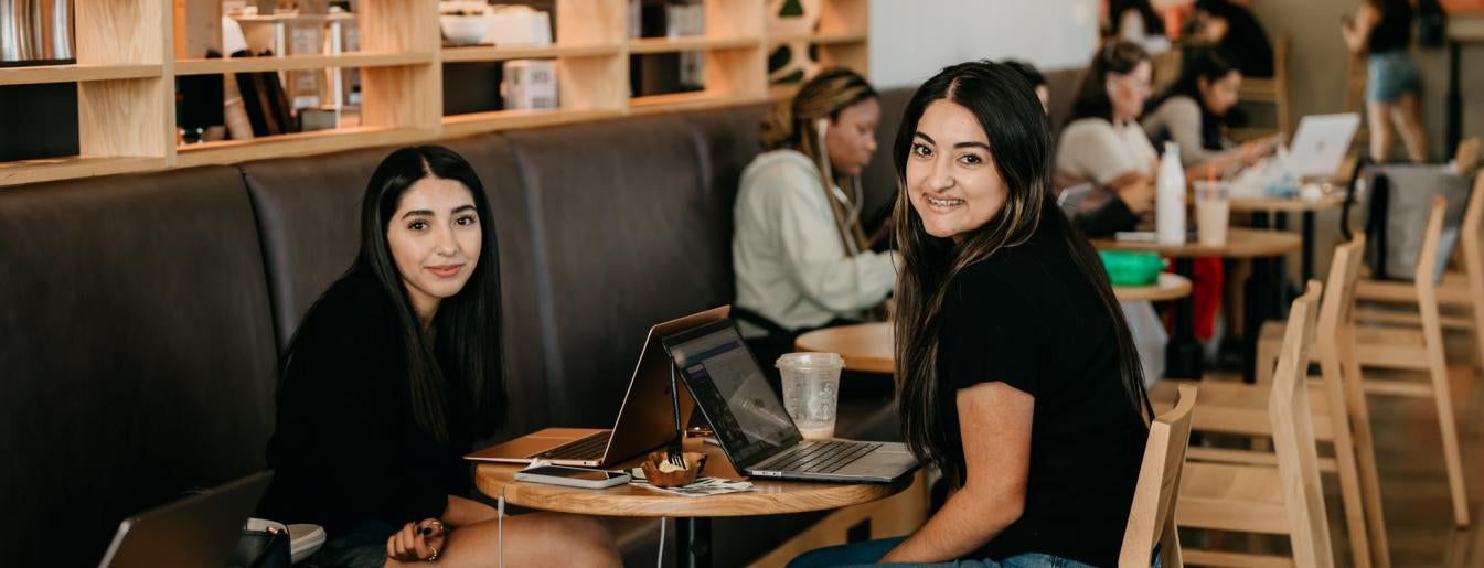 Students Smiling in Starbucks