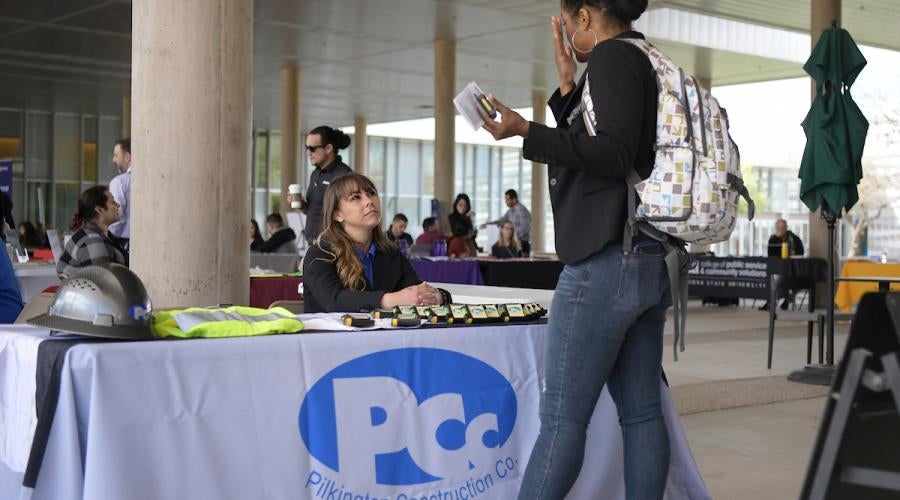Student and Rep speaking at Yuma Transfer and Career Expo