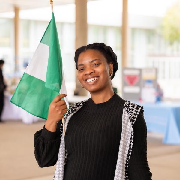 Nigerian Student Waving Flag